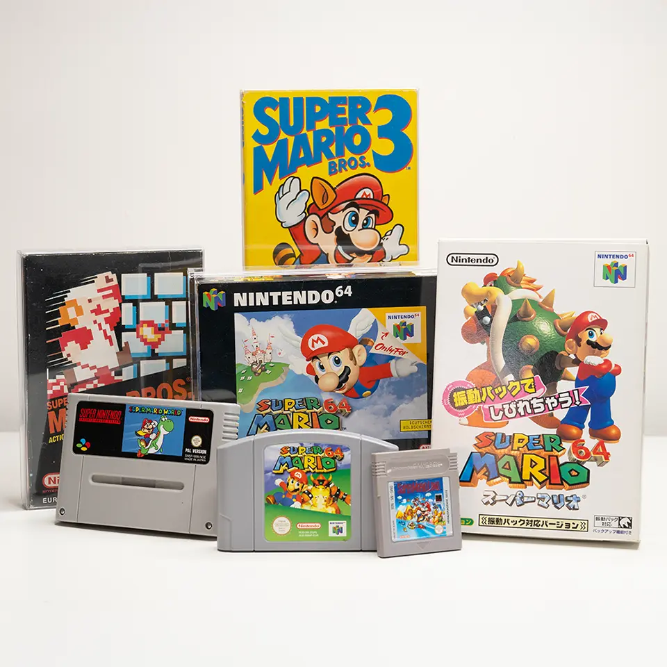 Originale Super-Mario-Spiele aus den 90er Jahren auf verschiedenen Konsolen, darunter SNES, N64 und Game Boy